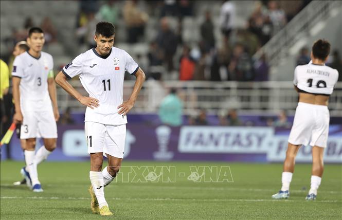 Nỗi buồn thua trận của các cầu thủ Kyrgyzstan. Ảnh: Hoàng Linh - PV TTXVN từ Qatar