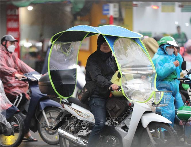 Hà Nội sáng 22/1/2204 rét đậm kèm theo mưa. Ảnh: Thanh Tùng - TTXVN 