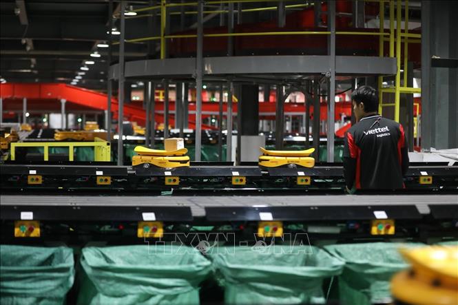 Hệ sinh thái logistics bao gồm phần mềm quản lý kho vận, hệ thống app/web, chuỗi giải pháp công nghệ chuyển phát giám sát trọng lượng, giám sát băng tải, khóa thông minh… Ảnh: Minh Quyết – TTXVN