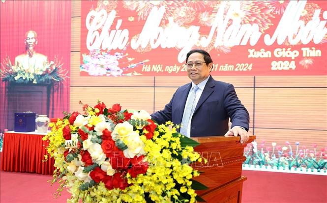 Prime Minister Pham Minh Chinh speaks at the meeting. VNA Photo: Dương Giang