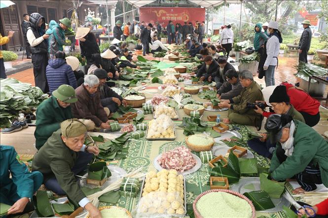 Chương trình gói bánh chưng tại ngày hội. Ảnh: Đức Phương - TTXVN