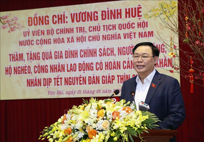 Chủ tịch Quốc hội Vương Đình Huệ chúc Tết Đảng bộ, chính quyền và nhân dân các dân tộc tỉnh Yên Bái. Ảnh: Nhan Sáng-TTXVN