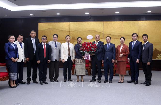 Delegates pose for a group photo after the reception. VNA Photo: Trần Lê Lâm