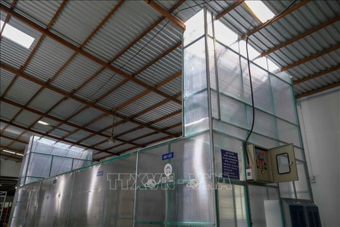 Solar energy used for a noodle drying system at a food processing factory in Hau Giang province. VNA Photo: Thanh Liêm