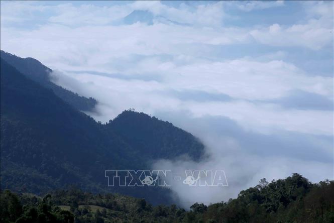 Clouds wrap around mountains, creating a heavenly scene in Sin Ho district. VNA Photo: Quý Trung