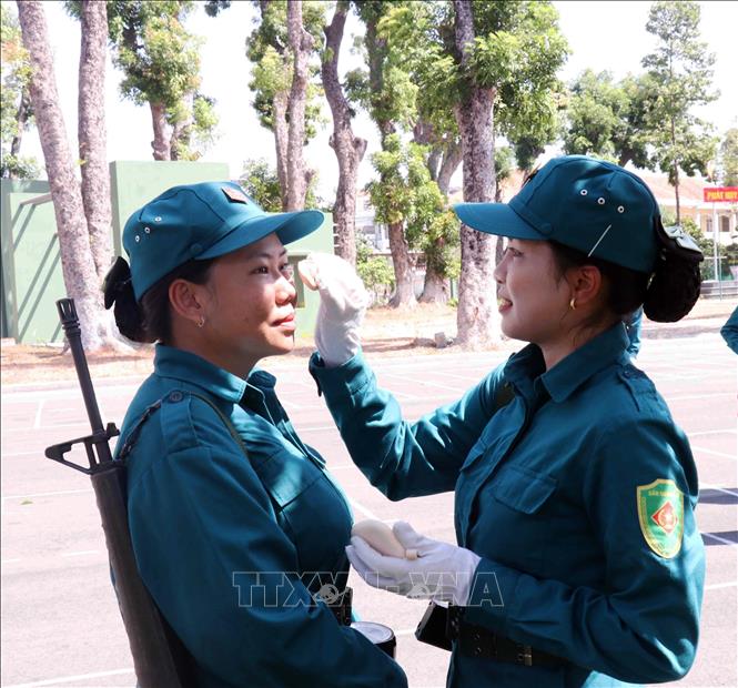 Phút giải lao giữa giờ luyện tập. Ảnh: Xuân Khu - TTXVN
