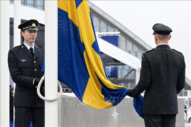 Lễ thượng cờ Thụy Điển tại trụ sở NATO ở Brussels, Bỉ ngày 11/3/2024. Ảnh: AFP/TTXVN