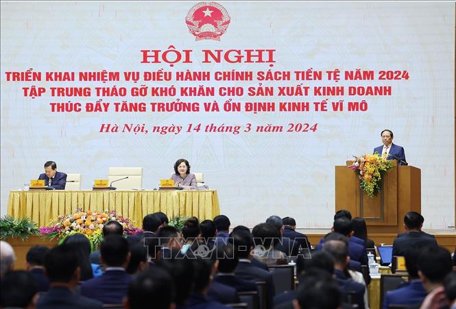 Thủ tướng Phạm Minh Chính phát biểu chỉ đạo Hội nghị triển khai nhiệm vụ điều hành chính sách tiền tệ năm 2024. Ảnh: Dương Giang-TTXVN
