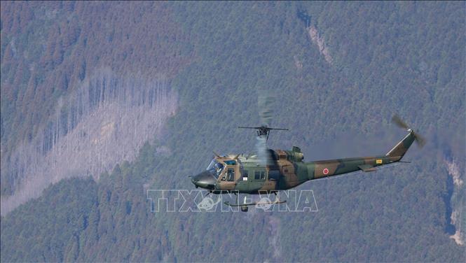 Trực thăng UH-1J của Lực lượng phòng vệ (SDF) Nhật Bản bay trên bầu trời tỉnh Oita, ngày 15/3/2024. Ảnh: Kyodo/TTXVN