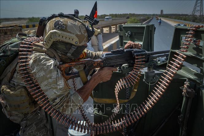 (Tư liệu) Lực lượng an ninh gác bên ngoài văn phòng của phái bộ Liên hợp quốc tại Afghanistan (UNAMA) tại Guzara, tỉnh Herat, Afghanistan, ngày 31/7/2021. Ảnh: AFP/TTXVN