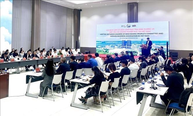 Leaders of the southern province of Binh Duong, a magnet for foreign direct investment in Vietnam, has a meeting with representatives from the German Business Association in Vietnam on March 19. VNA Photo: Huyền Trang