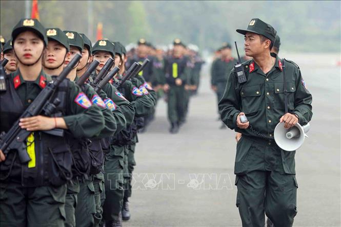 Khối nữ Cảnh sát đặc nhiệm tích cực tập luyện. Ảnh: Phạm Kiên - TTXVN