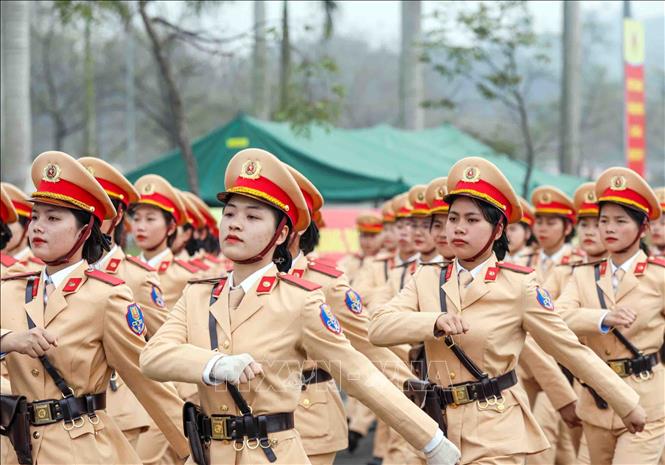Khối Cảnh sát giao thông do các cán bộ, chiến sĩ nữ đảm nhiệm. Ảnh: Phạm Kiên - TTXVN