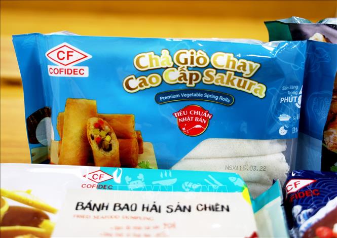 Thực phẩm chế biến thương hiệu COFIDEC xuất khẩu đi Nhật Bản. Ảnh: Hồng Đạt - TTXVN
