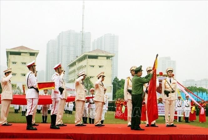 Đại tướng Tô Lâm, Bộ trưởng Bộ Công an trao tặng Huân chương Quân Công hạng Nhất của Chủ tịch nước cho lực lượng CSCĐ tại Lễ kỷ niệm 45 năm Ngày truyền thống (15/4/1974 – 15/4/2019). Ảnh: Nguyễn Dân - TTXVN