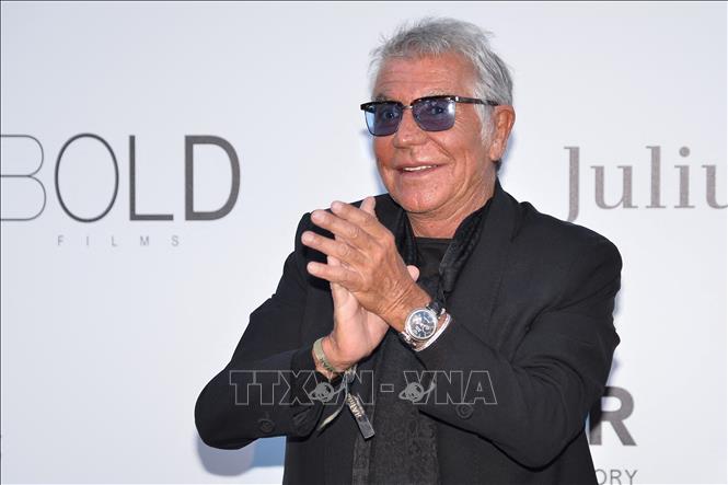Nhà thiết kế huyền thoại Roberto Cavalli tới dự một sự kiện trong khuôn khổ Liên hoan phim Cannes lần thứ 66 ở Cap d'Antibes, Pháp ngày 23/5/2013. Ảnh: AFP/TTXVN
