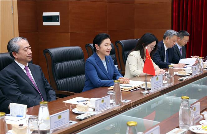 Bộ trưởng Bộ Tư pháp Trung Quốc Hạ Vinh phát biểu. Ảnh: Phạm Kiên - TTXVN