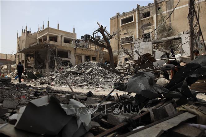 Những ngôi nhà bị phá hủy sau cuộc không kích của Israel Dải Gaza, ngày 23/4/2024. Ảnh: THX/TTXVN
