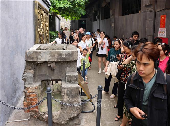 Visitors line up at Hoa Lo Prison relic site. VNA Photo: Thanh Tùng