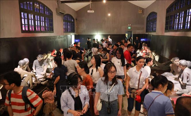 Hoa Lo Prison relic site is an intriguing destination to visit in Hanoi, attracting many domestic and foreign tourists. VNA Photo: Thanh Tùng