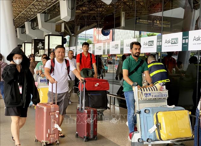Tourists at Tan Son Nhat airport during the holiday. VNA Photo