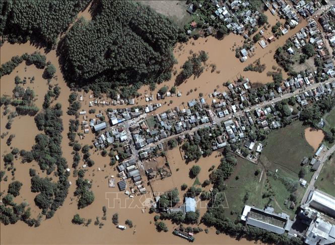 Cảnh ngập lụt tại Taquari, bang Rio Grande do Sul, Brazil ngày 7/5/2024. Ảnh: AFP/TTXVN