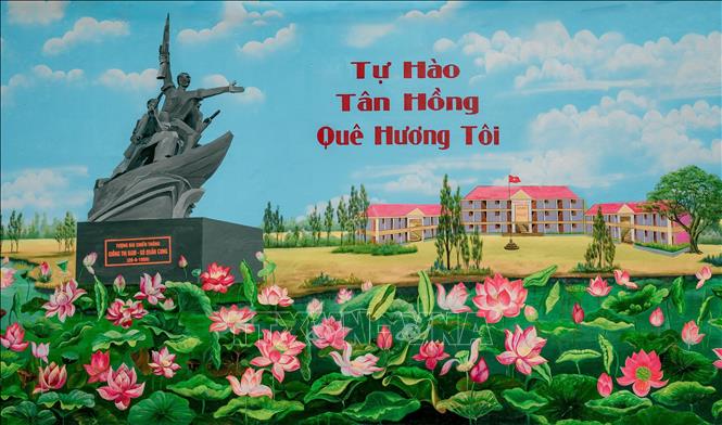 Tác phẩm bích họa “Tự hào Tân Hồng quê hương tôi” của Trường THCS Nguyễn Văn Tiệp (huyên Tân Hồng). Ảnh: TTXVN phát