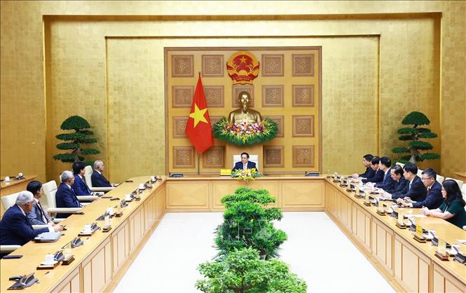 Prime Minister Pham Minh Chinh on May 20 receives Nagavara Ramaroa Narayana Murthy, co-founder of Infosys – one of the biggest IT companies in India. VNA Photo: Dương Giang