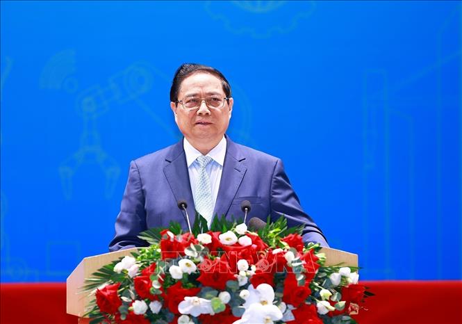 Prime Minister Pham Minh Chinh attends the national forum on labour productivity held by the Vietnam General Confederation of Labour in Hanoi on May 26. VNA Photo: Dương Giang