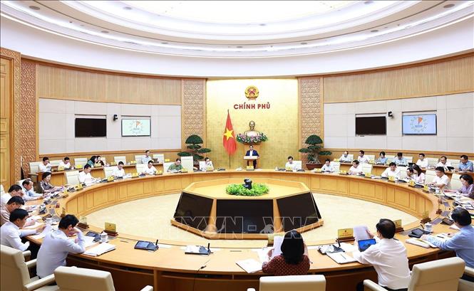 Prime Minister Pham Minh Chinh chairs the Government’s regular meeting. VNA Photo: Dương Giang