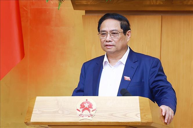 Prime Minister Pham Minh Chinh chairs the Government’s regular meeting. VNA Photo: Dương Giang