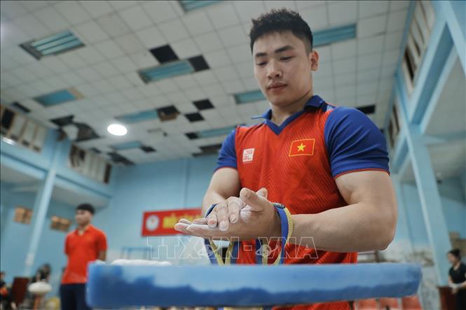 Sắp tới, đô cử Trịnh Văn Vinh sẽ có chuyến tập huấn ở nước ngoài đến giữa tháng 7. Ảnh: Minh Quyết – TTXVN