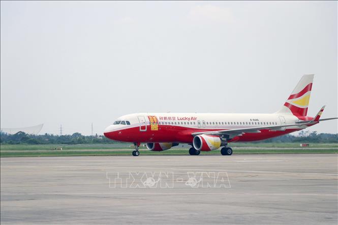 The first flight departing from Lijang, China’s Yunnan province lands at Cat Bi International Airport. VNA Photo: Hoàng Ngọc 