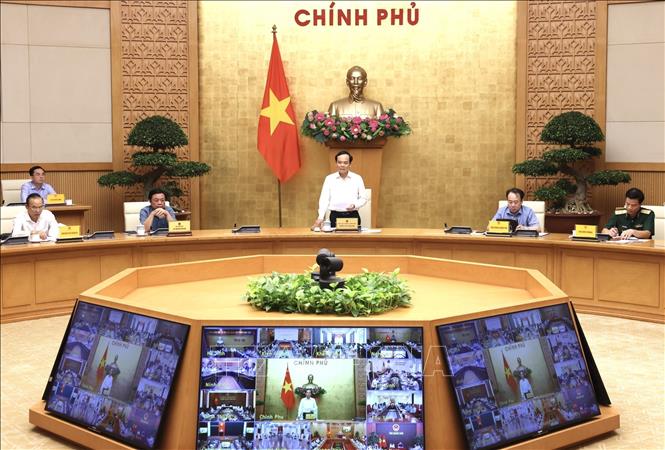 Phó Thủ tướng Trần Lưu Quang chủ trì họp Ban Chỉ đạo quốc gia về IUU. Ảnh: Lâm Khánh - TTXVN