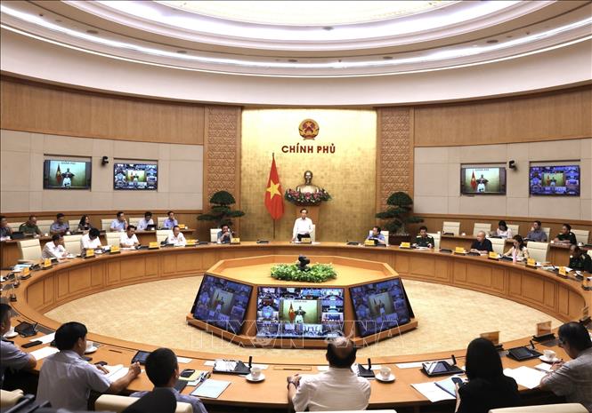 Phó Thủ tướng Trần Lưu Quang chủ trì họp Ban Chỉ đạo quốc gia về IUU. Ảnh: Lâm Khánh - TTXVN