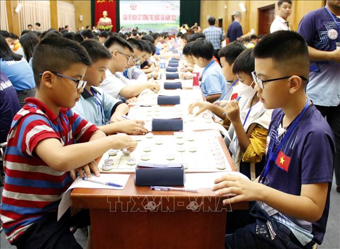 Các kỳ thủ U11 thi đấu. Ảnh: Đồng Thúy-TTXVN