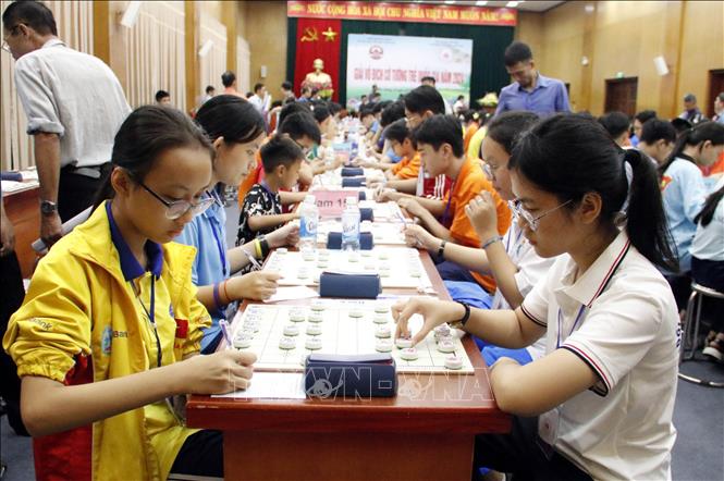 Các kỳ thủ U15 thi đấu. Ảnh: Đồng Thúy-TTXVN