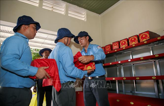 Toàn bộ 172 hài cốt liệt sĩ được đưa về Nghĩa trang liệt sĩ Đồi 82 huyện Tân Biên chờ thực hiện nghi thức truy điệu, an táng. Ảnh: Giang Phương - TTXVN