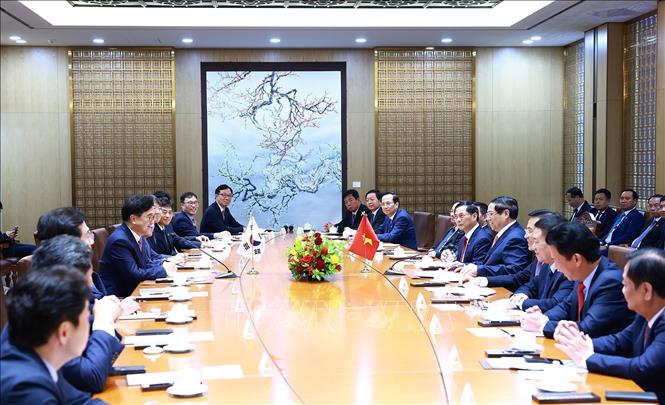 Prime Minister Pham Minh Chinh meets with Speaker of the National Assembly of the Republic of Korea Woo Won-shik in Seoul on July 2. VNA Photo: Dương Giang