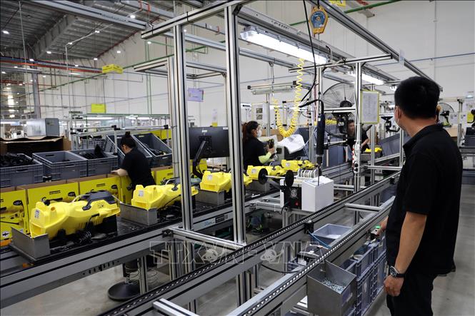Dây chuyền sản xuất của nhà máy sản xuất thiết bị làm sạch Karcher (KCN hậu cần cảng Tam Hiệp, huyện Núi Thành, tỉnh Quảng Nam). Ảnh Trần Tĩnh - TTXVN
