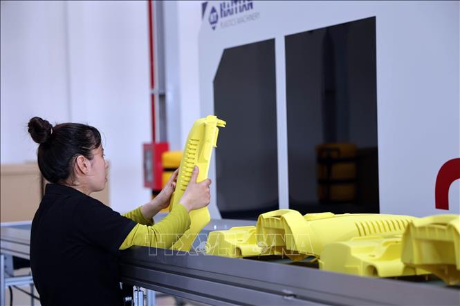 Dây chuyền sản xuất của nhà máy sản xuất thiết bị làm sạch Karcher (KCN hậu cần cảng Tam Hiệp, huyện Núi Thành, tỉnh Quảng Nam). Ảnh Trần Tĩnh - TTXVN