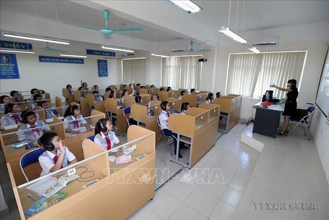 Trường THCS Chu Văn An, xã Tứ Hiệp, huyện Thanh Trì - trường đạt chuẩn Quốc gia, được đầu tư xây dựng theo tiêu chí Nông thôn mới. Ảnh: Vũ Sinh - TTXVN