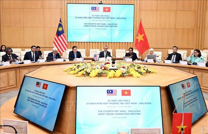 The 4th Vietnam-Malaysia Joint Trade Committee Meeting is held in Hanoi on July 9. VNA Photo: Trần Việt