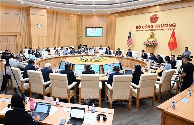 The 4th Vietnam-Malaysia Joint Trade Committee Meeting is held in Hanoi on July 9. VNA Photo: Trần Việt