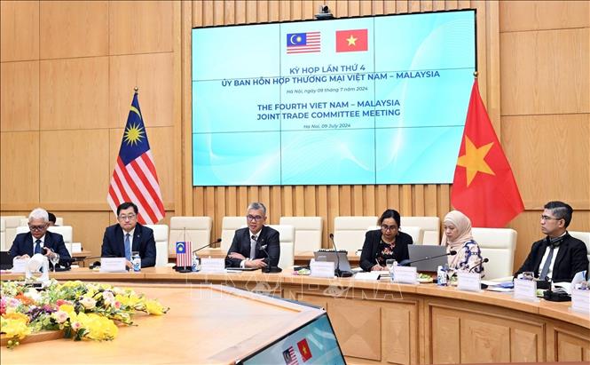 The 4th Vietnam-Malaysia Joint Trade Committee Meeting is held in Hanoi on July 9. VNA Photo: Trần Việt