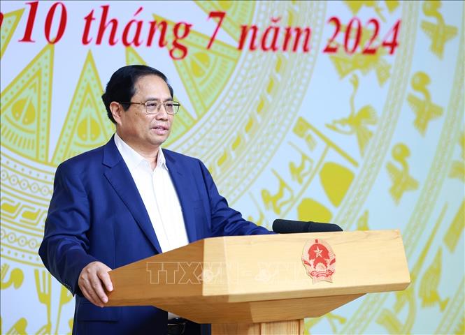 Thủ tướng Phạm Minh Chính chủ trì Hội nghị sơ kết 6 tháng Uỷ ban Quốc gia về chuyển đổi số và Đề án 06. Ảnh: Dương Giang-TTXVN
