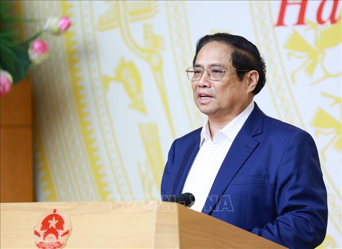 Thủ tướng Phạm Minh Chính chủ trì Hội nghị sơ kết 6 tháng Uỷ ban Quốc gia về chuyển đổi số và Đề án 06. Ảnh: Dương Giang-TTXVN
