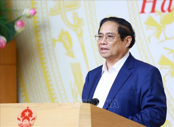 Prime Minister Pham Minh Chinh speaks at the meeting. VNA Photo: Dương Giang