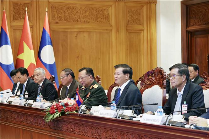 General Secretary of the Lao People's Revolutionary Party (LPRP) Central Committee and President of Laos Thongloun Sisoulith at the talks. VNA Photo: Nhan Sáng