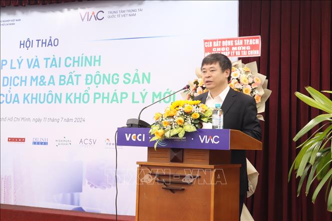 Ông Trần Ngọc Liêm, Giám đốc VCCI - HCM phát biểu tại hội thảo. Ảnh: Xuân Anh - TTXVN